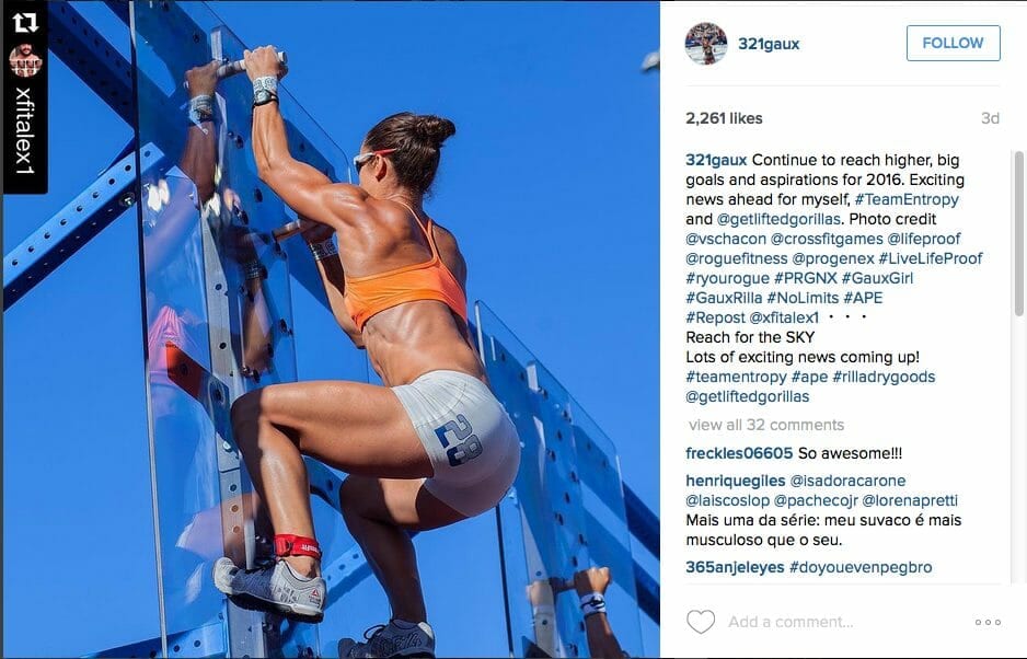 Femme presenting athlete climbs an transparent peg-board.