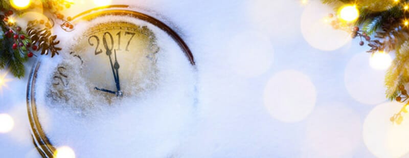 Faded snowy clock set on 2017