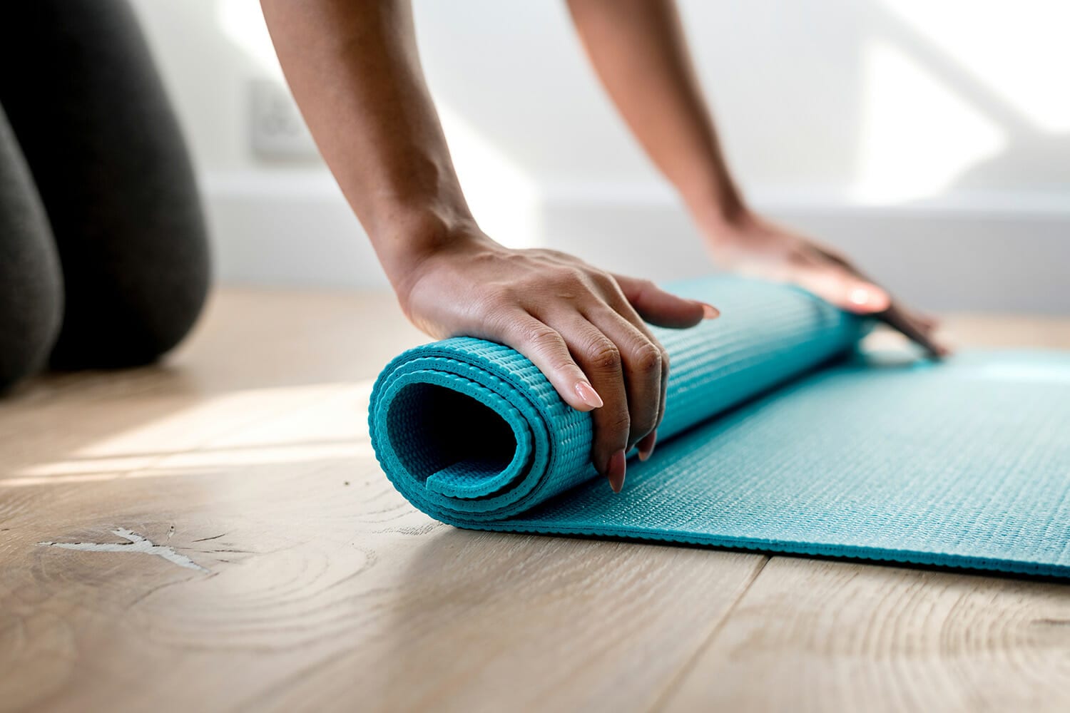 rolling up a fitness mat