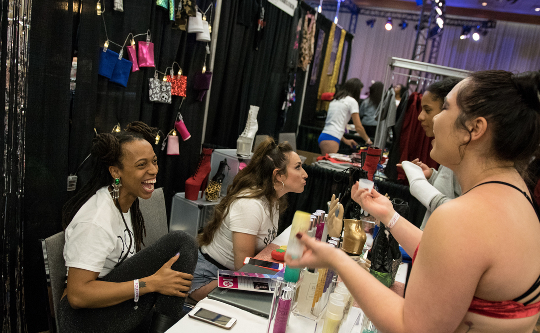 Customers engage at the Pixie Potion vendor booth