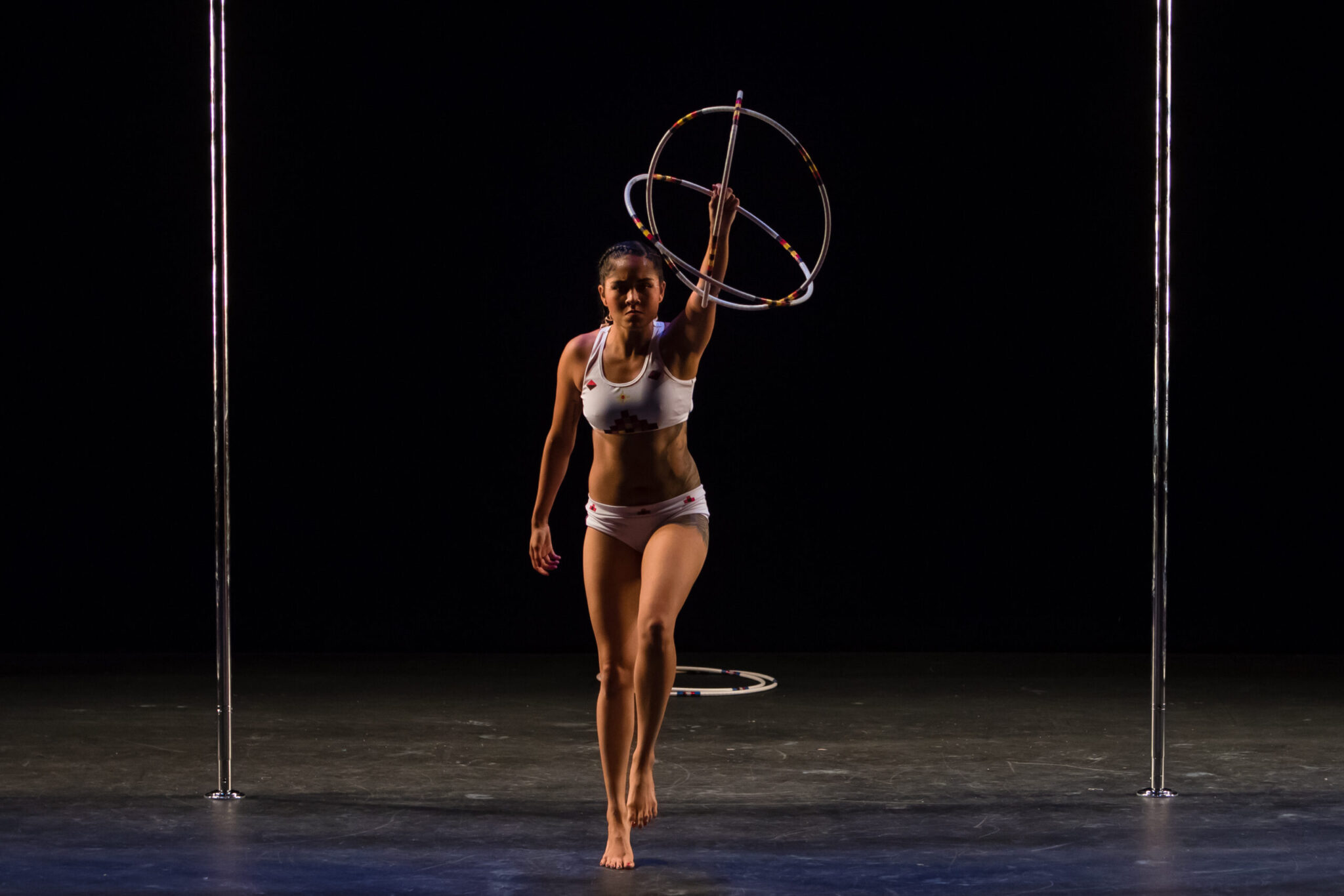 Dancer demonstrates unique small hoops.
