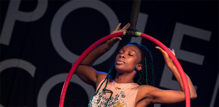 Dancer pauses with closed eyes during Lyra performance