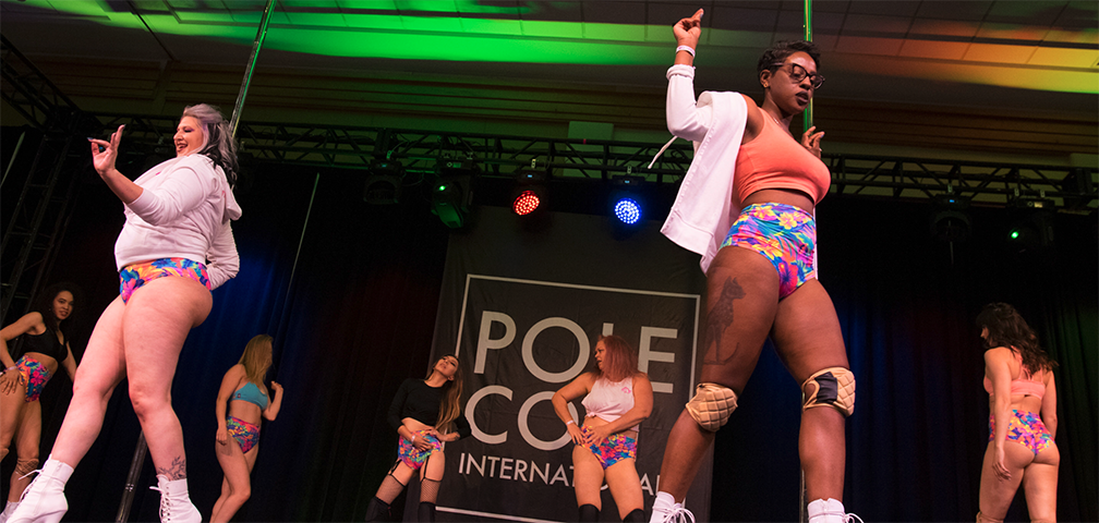 Pole dancers performing during the troupes and groups showcase.