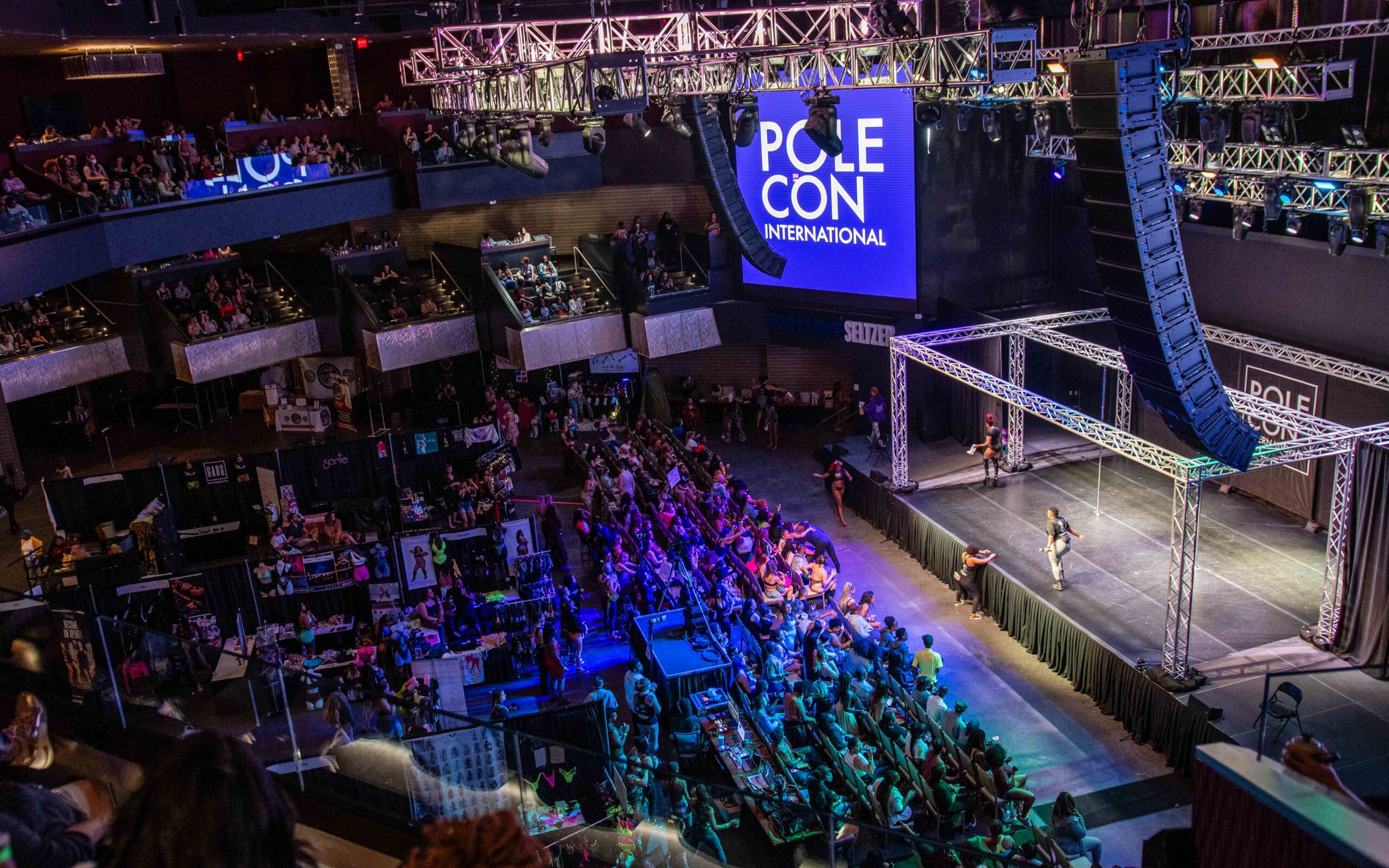 PoleCon audience, stage and scaffolding as seen from the balcony.