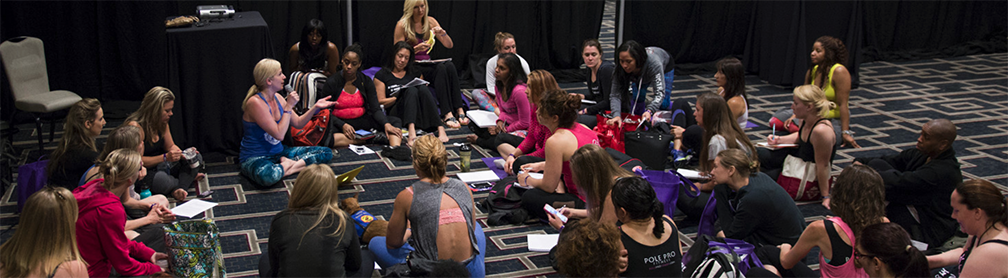 Students taking notes during a workshop.